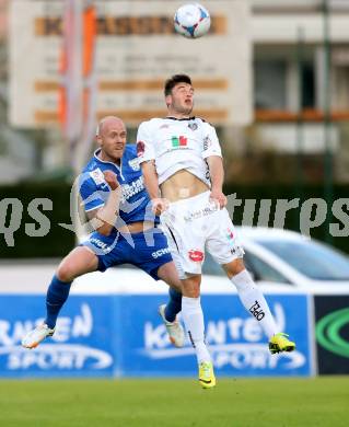 Fussball BUndesliga. RZ Pellets WAC gegen SV Scholz Groedig. Roland Putsche,  (WAC), Hannes Sigurdsson (Groedig). Wolfsberg, am 12.4.2014.
Foto: Kuess

---
pressefotos, pressefotografie, kuess, qs, qspictures, sport, bild, bilder, bilddatenbank