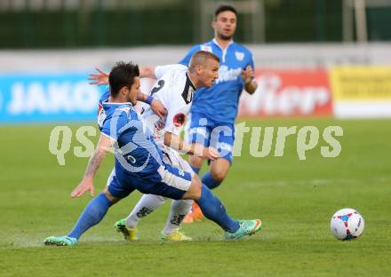 Fussball BUndesliga. RZ Pellets WAC gegen SV Scholz Groedig. Manuel Kerhe,  (WAC), Christoph Martschinko (Groedig). Wolfsberg, am 12.4.2014.
Foto: Kuess

---
pressefotos, pressefotografie, kuess, qs, qspictures, sport, bild, bilder, bilddatenbank