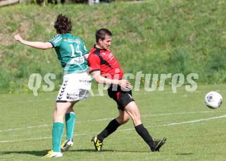 Fussball. Kaerntner Liga. Maria Saal gegen SV Feldkirchen/SV Oberglan. Rok Smid (Maria Saal), Robert Thomas Tiffner (Feldkirchen). Maria Saal, 12.4.2014.
Foto: Kuess
---
pressefotos, pressefotografie, kuess, qs, qspictures, sport, bild, bilder, bilddatenbank