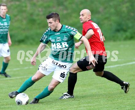 Fussball. Kaerntner Liga. Maria Saal gegen SV Feldkirchen/SV Oberglan. Senad Tiganj (Maria Saal), Mathias Regal (Feldkirchen). Maria Saal, 12.4.2014.
Foto: Kuess
---
pressefotos, pressefotografie, kuess, qs, qspictures, sport, bild, bilder, bilddatenbank