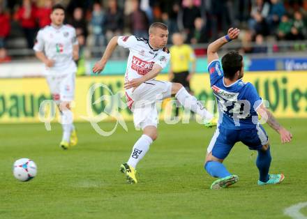 Fussball BUndesliga. RZ Pellets WAC gegen SV Scholz Groedig. Manuel Kerhe,  (WAC), Christoph Martschinko (Groedig). Wolfsberg, am 12.4.2014.
Foto: Kuess

---
pressefotos, pressefotografie, kuess, qs, qspictures, sport, bild, bilder, bilddatenbank