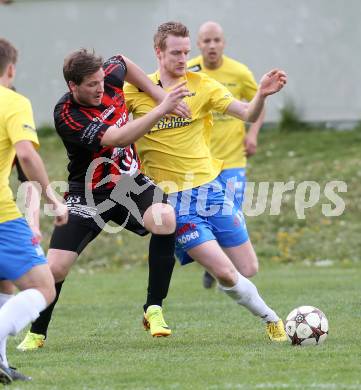 Fussball Unterliga Ost. St. Margarethen/Lav. gegen St. Michael/Lav. Alen Sirbubalo (St. Margarethen), Daniel Oberlaender (St. Michael). St. Margarethen/Lavanttal, am 12.4.2014.
Foto: Kuess
---
pressefotos, pressefotografie, kuess, qs, qspictures, sport, bild, bilder, bilddatenbank