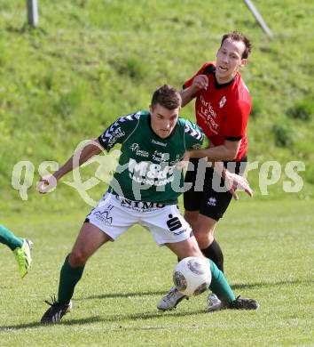 Fussball. Kaerntner Liga. Maria Saal gegen SV Feldkirchen/SV Oberglan. Martin Rauter Rauter (Maria Saal), Mathias Regal (Feldkirchen). Maria Saal, 12.4.2014.
Foto: Kuess
---
pressefotos, pressefotografie, kuess, qs, qspictures, sport, bild, bilder, bilddatenbank