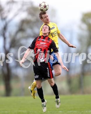 Fussball Unterliga Ost. St. Margarethen/Lav. gegen St. Michael/Lav. Patrick Schlacher (St. Margarethen), Daniel Oberlaender (St. Michael). St. Margarethen/Lavanttal, am 12.4.2014.
Foto: Kuess
---
pressefotos, pressefotografie, kuess, qs, qspictures, sport, bild, bilder, bilddatenbank