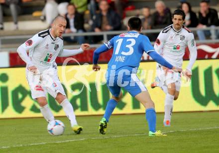 Fussball BUndesliga. RZ Pellets WAC gegen SV Scholz Groedig.  Peter Zulj,  (WAC), Jimenez Cabrera Ione Agoney (Groedig). Wolfsberg, am 12.4.2014.
Foto: Kuess

---
pressefotos, pressefotografie, kuess, qs, qspictures, sport, bild, bilder, bilddatenbank