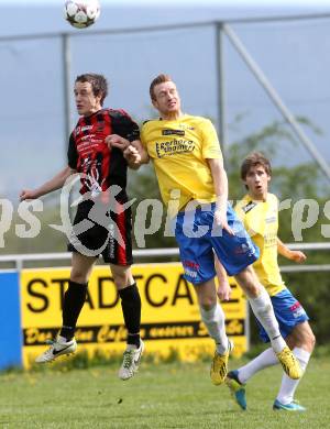 Fussball Unterliga Ost. St. Margarethen/Lav. gegen St. Michael/Lav. Patrick Schlacher (St. Margarethen), Daniel Oberlaender (St. Michael). St. Margarethen/Lavanttal, am 12.4.2014.
Foto: Kuess
---
pressefotos, pressefotografie, kuess, qs, qspictures, sport, bild, bilder, bilddatenbank