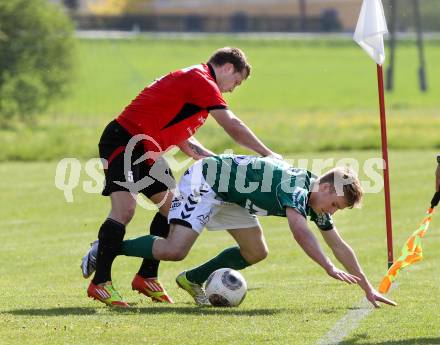 Fussball. Kaerntner Liga. Maria Saal gegen SV Feldkirchen/SV Oberglan. Zoran Jorgic (Maria Saal), Michael Groinig (Feldkirchen). Maria Saal, 12.4.2014.
Foto: Kuess
---
pressefotos, pressefotografie, kuess, qs, qspictures, sport, bild, bilder, bilddatenbank