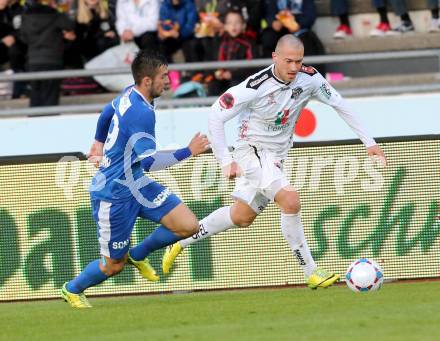 Fussball BUndesliga. RZ Pellets WAC gegen SV Scholz Groedig. Peter Zulj,  (WAC), Marvin Potzmann (Groedig). Wolfsberg, am 12.4.2014.
Foto: Kuess

---
pressefotos, pressefotografie, kuess, qs, qspictures, sport, bild, bilder, bilddatenbank