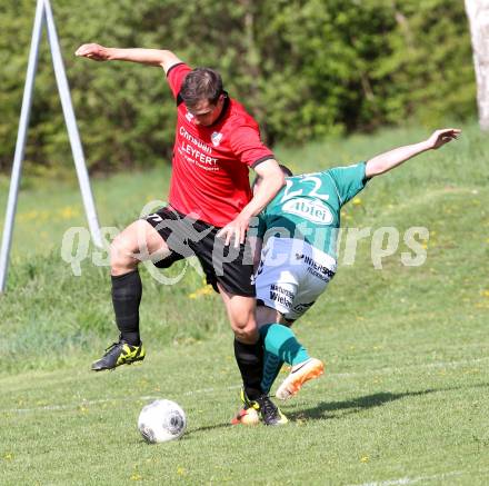 Fussball. Kaerntner Liga. Maria Saal gegen SV Feldkirchen/SV Oberglan. Rok Smid (Maria Saal), Patrick Rene Striednig (Feldkirchen). Maria Saal, 12.4.2014.
Foto: Kuess
---
pressefotos, pressefotografie, kuess, qs, qspictures, sport, bild, bilder, bilddatenbank