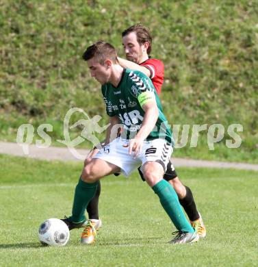 Fussball. Kaerntner Liga. Maria Saal gegen SV Feldkirchen/SV Oberglan. Roland Krenn (Maria Saal), Mathias Regal (Feldkirchen). Maria Saal, 12.4.2014.
Foto: Kuess
---
pressefotos, pressefotografie, kuess, qs, qspictures, sport, bild, bilder, bilddatenbank