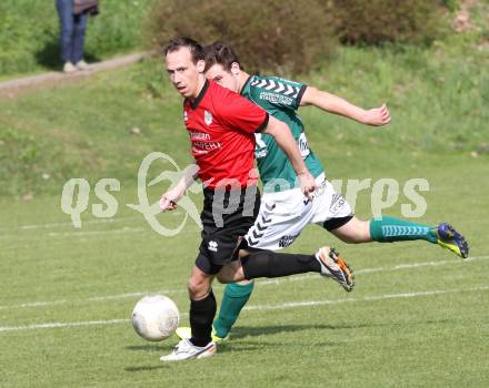 Fussball. Kaerntner Liga. Maria Saal gegen SV Feldkirchen/SV Oberglan. Martin Rauter Rauter (Maria Saal), Michael Fischer (Feldkirchen). Maria Saal, 12.4.2014.
Foto: Kuess
---
pressefotos, pressefotografie, kuess, qs, qspictures, sport, bild, bilder, bilddatenbank