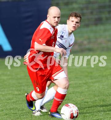 Fussball. Unterliga Ost. KAC 1909 gegen SG SAK Amateure. Daniel Barrazutti  (KAC), Rafael Fabian Lerchster (SAK). Klagenfurt, 12.4.2014.
Foto: Kuess
---
pressefotos, pressefotografie, kuess, qs, qspictures, sport, bild, bilder, bilddatenbank