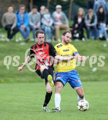 Fussball Unterliga Ost. St. Margarethen/Lav. gegen St. Michael/Lav. Patrick Schlacher, (St. Margarethen), Christoph Schifferl  (St. Michael). St. Margarethen/Lavanttal, am 12.4.2014.
Foto: Kuess
---
pressefotos, pressefotografie, kuess, qs, qspictures, sport, bild, bilder, bilddatenbank