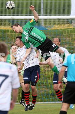 Fussball Unterliga Ost. Poggersdorf gegen St. Stefan/Lav. Stefan Rueckenbaum, (Poggersdorf), Stefan Stueckler  (St. Stefan), Poggersdorf, am 13.4.2014.
Foto: Kuess
---
pressefotos, pressefotografie, kuess, qs, qspictures, sport, bild, bilder, bilddatenbank