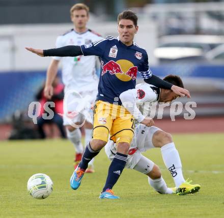 Fussball OEFB Cup. RZ Pellets WAC gegen FC Red Bull Salzburg. Roland Putsche,  (WAC), Soriano Casas Jonatan (Salzburg). Wolfsberg, am 16.4.2014.
Foto: Kuess

---
pressefotos, pressefotografie, kuess, qs, qspictures, sport, bild, bilder, bilddatenbank