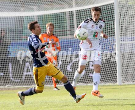 Fussball OEFB Cup. RZ Pellets WAC gegen FC Red Bull Salzburg.  Dario Baldauf,  (WAC), Florian Klein (Salzburg). Wolfsberg, am 16.4.2014.
Foto: Kuess

---
pressefotos, pressefotografie, kuess, qs, qspictures, sport, bild, bilder, bilddatenbank