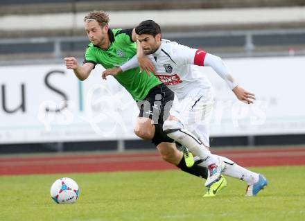 Fussball Regionalliga. RZ Pellets WAC gegen Pasching. Jose Antonio Solano Moreno, (WAC),  Lukas Moessner (Pasching). Wolfsberg, am 20.4.2014.
Foto: Kuess
---
pressefotos, pressefotografie, kuess, qs, qspictures, sport, bild, bilder, bilddatenbank