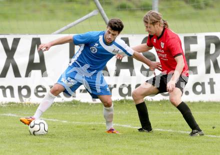 Fussball Kaerntner Liga. SG Annabichler Austria Amateure gegen Maria Saal.  Lumbardh Salihu, (ASV), Bernd Christian Schierhuber  (Maria Saal). Annabichl am 21.4.2014.
Foto: Kuess
---
pressefotos, pressefotografie, kuess, qs, qspictures, sport, bild, bilder, bilddatenbank