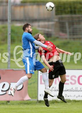 Fussball Kaerntner Liga. SG Annabichler Austria Amateure gegen Maria Saal.  Oliver Pusztai,  (ASV), Bernhard Walzl (Maria Saal). Annabichl am 21.4.2014.
Foto: Kuess
---
pressefotos, pressefotografie, kuess, qs, qspictures, sport, bild, bilder, bilddatenbank