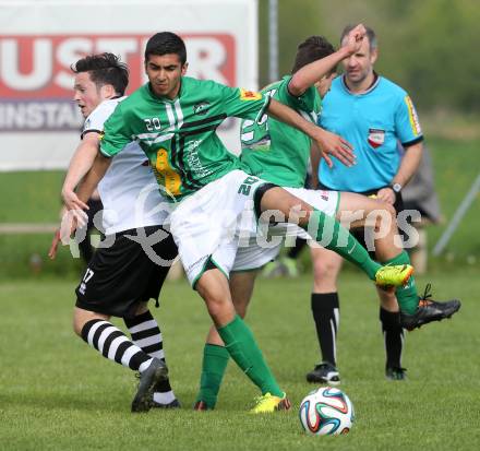 Fussball. Unterliga Ost. Kuehnsdorf gegen St. Stefan. Thorsten Wintschnig (Kuehnsdorf), Parsa Djawadiraad (St. Stefan). Kuehnsdorf, 26. 4.2014.
Foto: Kuess
---
pressefotos, pressefotografie, kuess, qs, qspictures, sport, bild, bilder, bilddatenbank