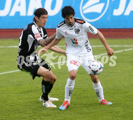 Fussball BUndesliga. RZ Pellets WAC gegen SK Puntigamer Sturm Graz. Ynclan Pajares Jacobo Maria (WAC), Nikola Vujadinovic (Sturm). Wolfsberg, am 27.4.2014.
Foto: Kuess
---
pressefotos, pressefotografie, kuess, qs, qspictures, sport, bild, bilder, bilddatenbank