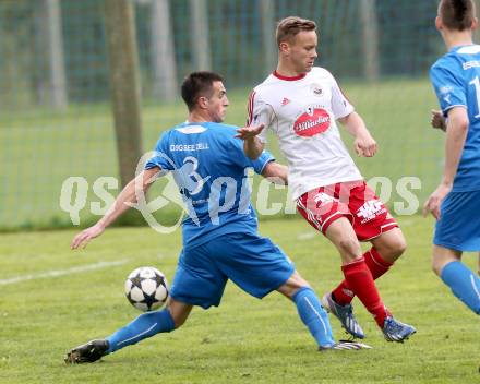 Fussball Unterliga Ost. DSG Sele Zell gegen Ludmannsdorf. DraganJuric, (Zell), Michael Augustin Jakopitsch  (Ludmannsdorf). Zell, 1.5.2014.
Foto: Kuess
---
pressefotos, pressefotografie, kuess, qs, qspictures, sport, bild, bilder, bilddatenbank