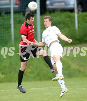 Fussball Kaerntner Liga. Maria Saal gegen ATUS Ferlach. Miran Galic, (Maria Saal), Alexander Krainer  (Ferlach). Maria Saal, am 3.5.2014.
Foto: Kuess
---
pressefotos, pressefotografie, kuess, qs, qspictures, sport, bild, bilder, bilddatenbank