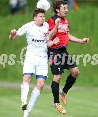 Fussball Kaerntner Liga. Maria Saal gegen ATUS Ferlach. Roland Krenn, (Maria Saal), Thomas Ogris  (Ferlach). Maria Saal, am 3.5.2014.
Foto: Kuess
---
pressefotos, pressefotografie, kuess, qs, qspictures, sport, bild, bilder, bilddatenbank