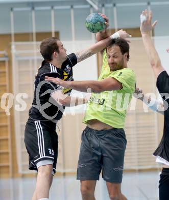 Handball Bundesliga. HC Kaernten gegen Fivers WAT Margareten. Branko Bedekovic,  (HCK), Benjamin Hirn (Margareten). Viktring, am 4.5.2014.
Foto: Kuess
---
pressefotos, pressefotografie, kuess, qs, qspictures, sport, bild, bilder, bilddatenbank