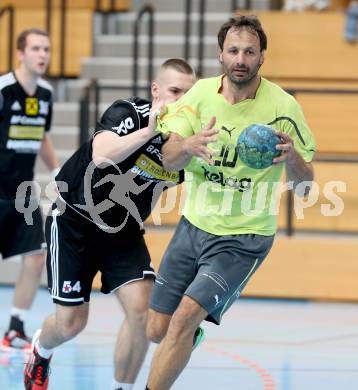 Handball Bundesliga. HC Kaernten gegen Fivers WAT Margareten. Branko Bedekovic, (HCK), Nikola Aljetic  (Margareten). Viktring, am 4.5.2014.
Foto: Kuess
---
pressefotos, pressefotografie, kuess, qs, qspictures, sport, bild, bilder, bilddatenbank