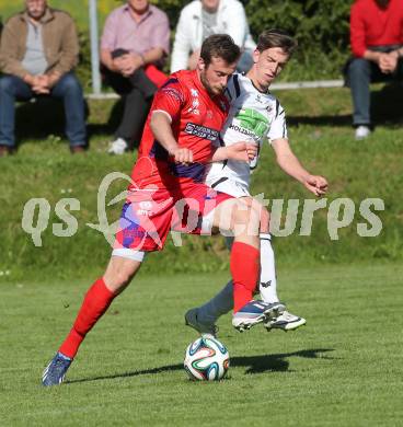 Fussball. Unterliga Ost. Ludmannsdorf gegen SG SAK Amateure 1b. Markus Partl (Ludmannsdorf), Daniel Fratschko  (SAK). Ludmannsdorf, 4.5.2014
Foto: Kuess
---
pressefotos, pressefotografie, kuess, qs, qspictures, sport, bild, bilder, bilddatenbank