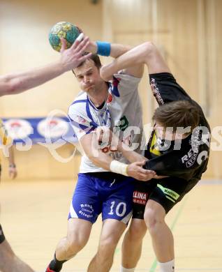 Handball HLA. SC Kelag Ferlach gegen HSG Raiffeisen Baernbach/Koeflach. 
Miro Barisic, (SCF), Daniel Dicker  (Baernbach/Koeflach). Ferlach, am 9.5.2014.
Foto: Kuess 
---
pressefotos, pressefotografie, kuess, qs, qspictures, sport, bild, bilder, bilddatenbank