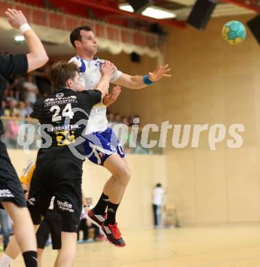 Handball HLA. SC Kelag Ferlach gegen HSG Raiffeisen Baernbach/Koeflach. 
Miro Barisic, (SCF), Daniel Dicker (Baernbach/Koeflach). Ferlach, am 9.5.2014.
Foto: Kuess 
---
pressefotos, pressefotografie, kuess, qs, qspictures, sport, bild, bilder, bilddatenbank