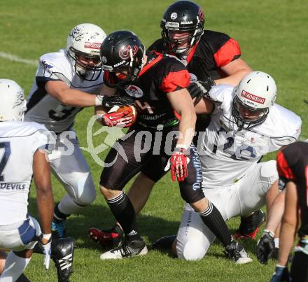 America Football. Carinthian Lions gegen Blue Devils Dornbirn. Pico Rabitsch (Lions), Andreas Stark (Dornbirn). Klagenfurt, 10.5.2014.
Foto: Kuess
---
pressefotos, pressefotografie, kuess, qs, qspictures, sport, bild, bilder, bilddatenbank