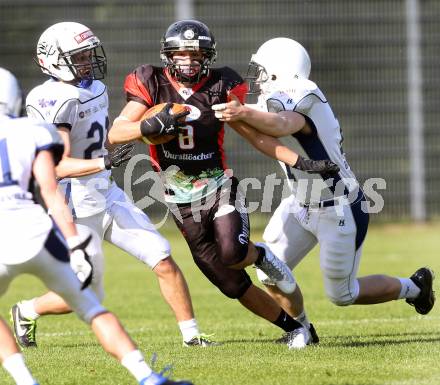 America Football. Carinthian Lions gegen Blue Devils Dornbirn. Lopes Dos Santos (Lions),  Benjamin Wegmueller, Philip Narat (Dornbirn). Klagenfurt, 10.5.2014.
Foto: Kuess
---
pressefotos, pressefotografie, kuess, qs, qspictures, sport, bild, bilder, bilddatenbank