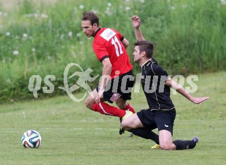 Fussball. Kaerntner Liga. Koettmannsdorf gegen Maria Saal. Daniel Globotschnig (Koettmannsdorf), Bernhard Walzl (Maria Saal). Koettmannsdorf, 11.5.2014.
Foto: Kuess
---
pressefotos, pressefotografie, kuess, qs, qspictures, sport, bild, bilder, bilddatenbank