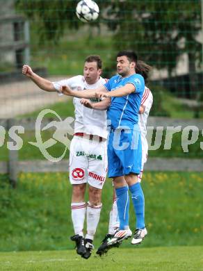 Fussball Unterliga Ost. DSG Sele Zell gege St. Michael/Bleiburg. Daniel Cumurdzic (Zell), Davorin Ferlez (St. Michael). Zell, am 11.5.2014.
Foto: Kuess
---
pressefotos, pressefotografie, kuess, qs, qspictures, sport, bild, bilder, bilddatenbank