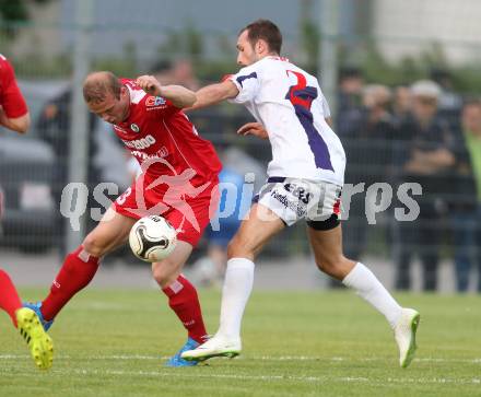 Fussball Regionalliga. SAK gegen Vorwaerts Steyr. Marjan Kropiunik, (SAK), Michael Popp (Steyr). Welzenegg, am 23.5.2014.
Foto: Kuess
---
pressefotos, pressefotografie, kuess, qs, qspictures, sport, bild, bilder, bilddatenbank