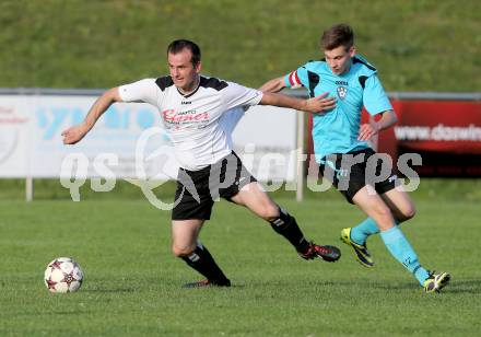 Fussball. 2. Klasse B. Drautal 1b gegen St. Egyden. Florian Nagelschmied,  (Drautal), Denis Prsic (St. Egyden). Feistritz/Drau, am 6.6.2014.
Foto: Kuess
---
pressefotos, pressefotografie, kuess, qs, qspictures, sport, bild, bilder, bilddatenbank