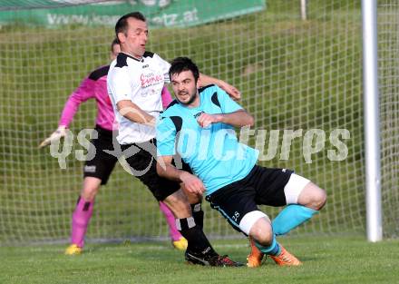 Fussball. 2. Klasse B. Drautal 1b gegen St. Egyden. Marko Kovacic (Drautal), Denis Prsic (St. Egyden). Feistritz/Drau, am 6.6.2014.
Foto: Kuess
---
pressefotos, pressefotografie, kuess, qs, qspictures, sport, bild, bilder, bilddatenbank