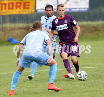 Fussball Bundesliga. Testspiel. FK Austria Wien gegen FC Dinamo Moskau. Christian Ramsebner (Austria), Kevin Kurany (Moskau). Seeboden, am 2.7.2014.
Foto: Kuess

---
pressefotos, pressefotografie, kuess, qs, qspictures, sport, bild, bilder, bilddatenbank