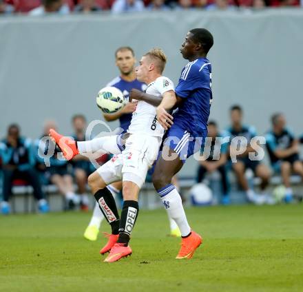 Fussball Testspiel. RZ Pellets WAC gegen Chelsea FC.  Tadej Trdina (WAC), Filipe Luis, (Chelsea). Klagenfurt, am 23.7.2014.
Foto: Kuess
---
pressefotos, pressefotografie, kuess, qs, qspictures, sport, bild, bilder, bilddatenbank