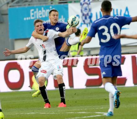 Fussball Testspiel. RZ Pellets WAC gegen Chelsea FC.  Tadej Trdina, (WAC),  John Terry (Chelsea). Klagenfurt, am 23.7.2014.
Foto: Kuess
---
pressefotos, pressefotografie, kuess, qs, qspictures, sport, bild, bilder, bilddatenbank