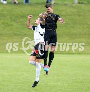 Fussball Kaerntner Liga. Koettmannsdorf gegen SV Spittal. Daniel Globotschnig,  (Koettmannsdorf), Matic Sever (Spittal). Koettmannsdorf, am 27.7.2014.
Foto: Kuess
---
pressefotos, pressefotografie, kuess, qs, qspictures, sport, bild, bilder, bilddatenbank