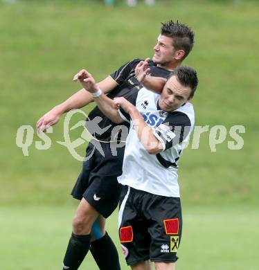 Fussball Kaerntner Liga. Koettmannsdorf gegen SV Spittal. Daniel Globotschnig, (Koettmannsdorf), Thomas Lagler (Spittal). Koettmannsdorf, am 27.7.2014.
Foto: Kuess
---
pressefotos, pressefotografie, kuess, qs, qspictures, sport, bild, bilder, bilddatenbank