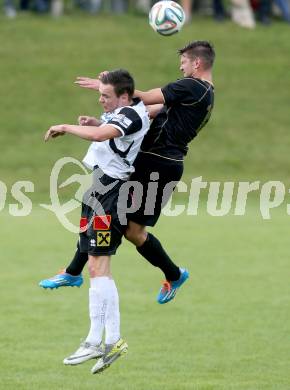 Fussball Kaerntner Liga. Koettmannsdorf gegen SV Spittal. Daniel Globotschnig, (Koettmannsdorf), Thomas Lagler (Spittal). Koettmannsdorf, am 27.7.2014.
Foto: Kuess
---
pressefotos, pressefotografie, kuess, qs, qspictures, sport, bild, bilder, bilddatenbank