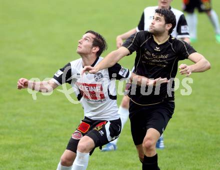 Fussball Kaerntner Liga. Koettmannsdorf gegen SV Spittal. Stephan Buergler,  (Koettmannsdorf), Mario Habunek (Spittal). Koettmannsdorf, am 27.7.2014.
Foto: Kuess
---
pressefotos, pressefotografie, kuess, qs, qspictures, sport, bild, bilder, bilddatenbank