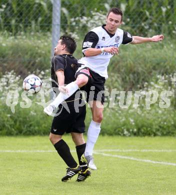 Fussball Kaerntner Liga. Koettmannsdorf gegen SV Spittal. Christian Sablatnig, (Koettmannsdorf), Thomas Lagler (Spittal). Koettmannsdorf, am 27.7.2014.
Foto: Kuess
---
pressefotos, pressefotografie, kuess, qs, qspictures, sport, bild, bilder, bilddatenbank