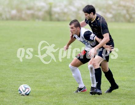 Fussball Kaerntner Liga. Koettmannsdorf gegen SV Spittal. Stephan Buergler,  (Koettmannsdorf), Matic Sever (Spittal). Koettmannsdorf, am 27.7.2014.
Foto: Kuess
---
pressefotos, pressefotografie, kuess, qs, qspictures, sport, bild, bilder, bilddatenbank