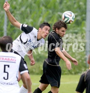 Fussball Kaerntner Liga. Koettmannsdorf gegen SV Spittal. Jakob Orgonyi,  (Koettmannsdorf), Rafael Graf (Spittal). Koettmannsdorf, am 27.7.2014.
Foto: Kuess
---
pressefotos, pressefotografie, kuess, qs, qspictures, sport, bild, bilder, bilddatenbank